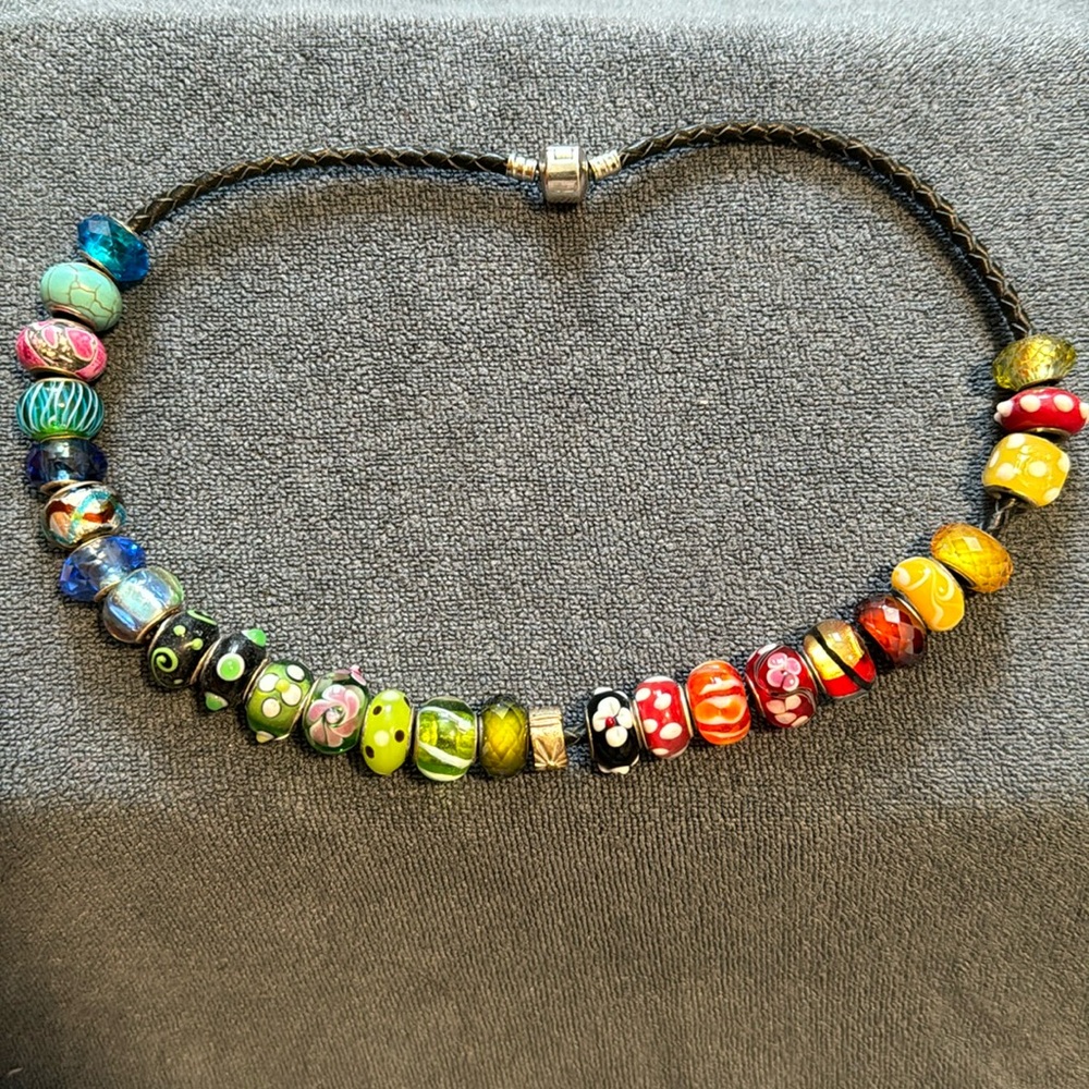 Pandora style beads on a leather cord
